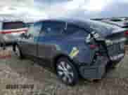 2023 Tesla Model Y Long Range z VIN 7SAYGDEE4PA147170, wystawiony jako Copart lot #48218945 z przebiegiem Nie podano mil oraz Szkoda całkowita • Salvage title. Historia ofert i sprzedaży dostępna na DreamBid. Obrazek 2.