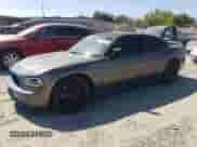 2010 Dodge Charger R/T with VIN 2B3CA5CT5AH151010, listed as a Copart auction lot 66169725 with 137,233 mi miles and Salvage title. Bid and sale history available at DreamBid. Image 1.
