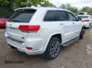 2017 Jeep Grand Cherokee Overland with VIN 1C4RJFCG8HC663780, listed as a IAAI auction lot 43290580 with 105,136 mi miles and . Bid and sale history available at DreamBid. Image 4.