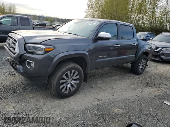 2022 Toyota Tacoma Limited with VIN 3TMGZ5AN4NM528267, listed as a Copart auction lot 52534795 with 40,559 mi miles and Salvage title. Bid and sale history available at DreamBid. Image 1.