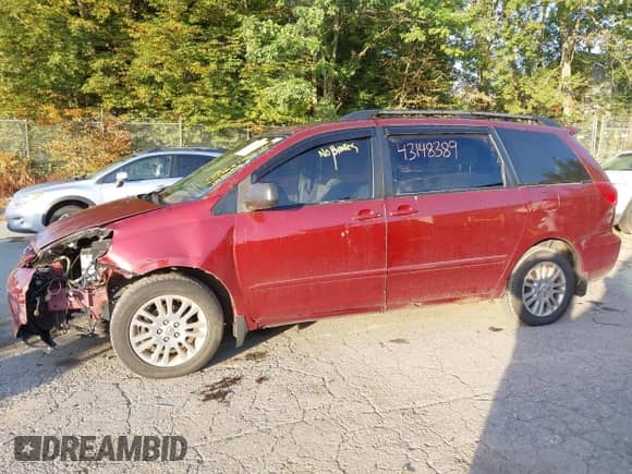 2008 Toyota Sienna LE with VIN 5TDBK23C48S013637, listed as a IAAI auction lot 43148389 with 207,661 mi miles and . Bid and sale history available at DreamBid. Image 12.