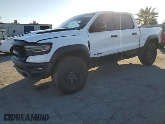 2023 Ram 1500 TRX z VIN 1C6SRFU96PN503305, wystawiony jako Copart lot #50205075 z przebiegiem 20 794 mil mil oraz Czysty tytuł • Clean title. Historia ofert i sprzedaży dostępna na DreamBid. Obrazek 1.