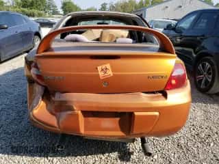 2005 Dodge Neon SXT z VIN 1B3ES56C85D165777, wystawiony jako Copart lot #69057594 z przebiegiem 93 026 mil mil oraz Szkoda całkowita • Salvage title. Historia ofert i sprzedaży dostępna na DreamBid. Obrazek 6.