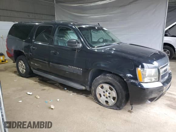 2011 Chevrolet Suburban LT с VIN 1GNSKJE32BR215607, выставлен на аукционе Copart как лот 60347905 с пробегом 284 762 миль миль и На запчасти • Non repairable. История ставок и продаж доступна на DreamBid. Изображение 4.