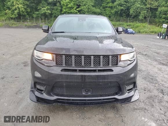 2018 Jeep Grand Cherokee SRT with VIN 1C4RJFDJ7JC212775, listed as a Copart auction lot 60243165 with Not provided miles and Salvage title. Bid and sale history available at DreamBid. Image 5.