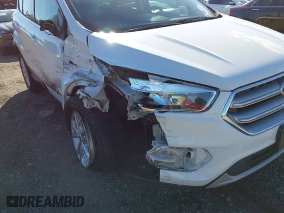 2017 Ford Escape SE with VIN 1FMCU9GD1HUE75803, listed as a IAAI auction lot 43172761 with 27,469 mi miles and . Bid and sale history available at DreamBid. Image 6.