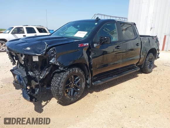 2024 Chevrolet Silverado 1500 LT Trail Boss z VIN 3GCUDFED1RG287720, wystawiony jako IAAI lot #42082209 z przebiegiem 23 011 mil mil oraz . Historia ofert i sprzedaży dostępna na DreamBid. Obrazek 2.