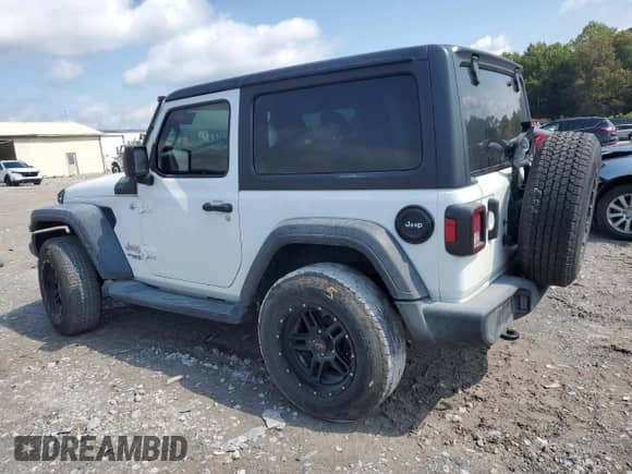 2020 Jeep Wrangler Sport S with VIN 1C4GJXAG5LW302823, listed as a Copart auction lot 71611065 with 67,430 mi miles and Salvage title. Bid and sale history available at DreamBid. Image 2.