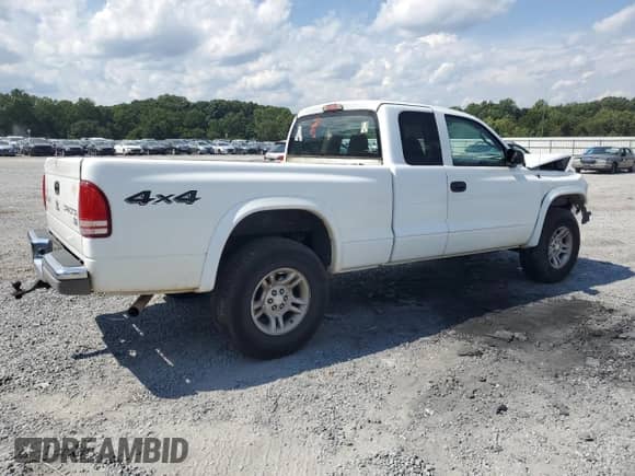 2004 Dodge Dakota SLT с VIN 1D7HG42N34S685318, выставлен на аукционе Copart как лот 71077095 с пробегом 163 925 миль миль и Списание • Salvage title. История ставок и продаж доступна на DreamBid. Изображение 3.