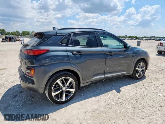 2020 Hyundai Kona Ultimate с VIN KM8K53A5XLU421139, выставлен на аукционе Copart как лот 71557165 с пробегом 128 218 миль миль и Списание • Salvage title. История ставок и продаж доступна на DreamBid. Изображение 3.