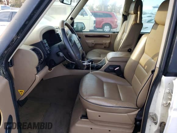 2000 Land Rover Discovery Cloth with VIN SALTY1543YA273374, listed as a Copart auction lot 86026964 with 115,114 mi miles and Clean title. Bid and sale history available at DreamBid. Image 7.