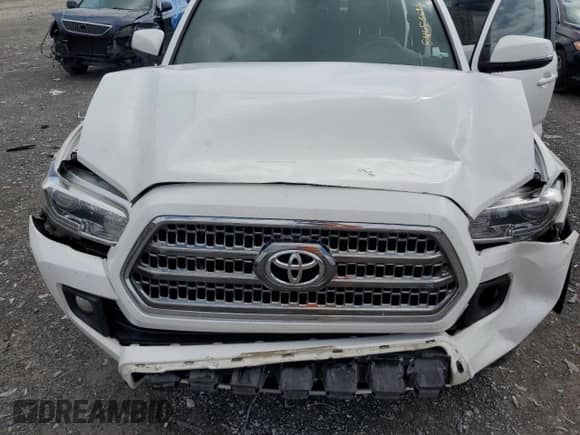 2017 Toyota Tacoma TRD Off Road with VIN 3TMDZ5BNXHM027454, listed as a Copart auction lot 84053695 with 131,703 mi miles and Salvage title. Bid and sale history available at DreamBid. Image 11.