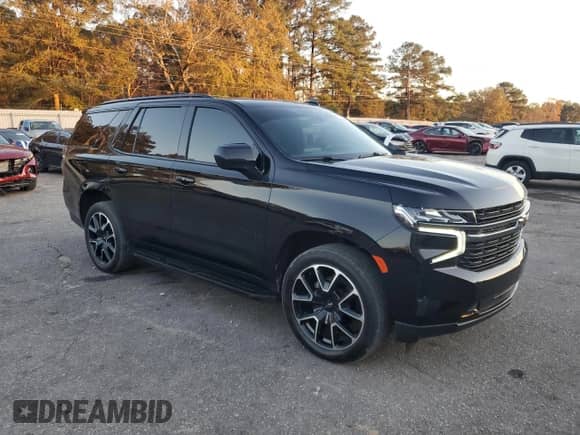 2022 Chevrolet Tahoe RST z VIN 1GNSCRKD5NR261980, wystawiony jako Copart lot #85032304 z przebiegiem 31 571 mil mil oraz Szkoda całkowita • Salvage title. Historia ofert i sprzedaży dostępna na DreamBid. Obrazek 4.