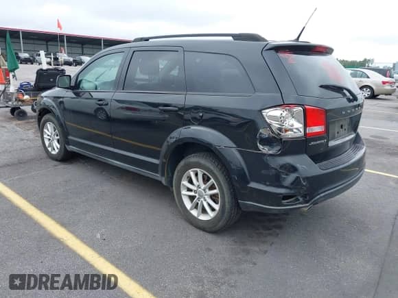 2013 Dodge Journey SXT with VIN 3C4PDCBG9DT584454, listed as a IAAI auction lot 43380213 with 128,968 mi miles and . Bid and sale history available at DreamBid. Image 3.