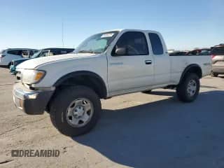 1998 Toyota Tacoma with VIN 4TASM92N1WZ175674, listed as a Copart auction lot 89734125 with 214,966 mi miles and Salvage title. Bid and sale history available at DreamBid. Image 1.