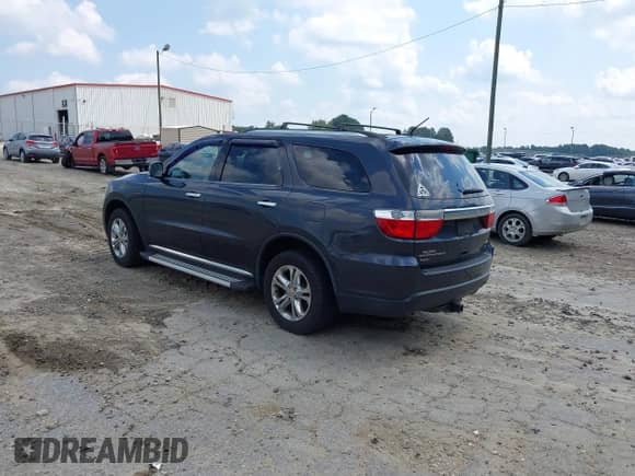 2013 Dodge Durango Crew with VIN 1C4RDJDGXDC691941, listed as a IAAI auction lot 43139534 with 111,750 mi miles and . Bid and sale history available at DreamBid. Image 3.