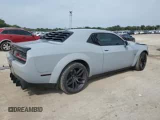 2021 Dodge Challenger R/T Scat Pack Widebody z VIN 2C3CDZFJ2MH503086, wystawiony jako Copart lot #71727655 z przebiegiem 65 806 mil mil oraz Szkoda całkowita • Salvage title. Historia ofert i sprzedaży dostępna na DreamBid. Obrazek 3.