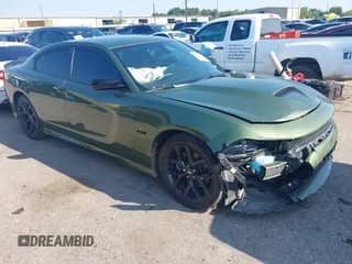 2023 Dodge Charger R/T with VIN 2C3CDXCT1PH535767, listed as a IAAI auction lot 43178270 with 26,987 mi miles and . Bid and sale history available at DreamBid. Image 1.