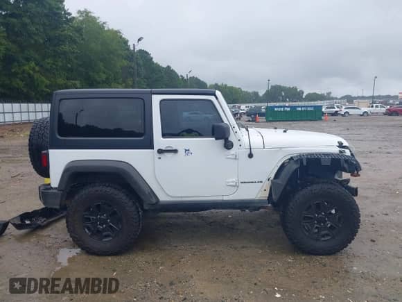 2015 Jeep Wrangler Sport with VIN 1C4AJWAG1FL593777, listed as a IAAI auction lot 42952137 with 99,393 mi miles and . Bid and sale history available at DreamBid. Image 14.