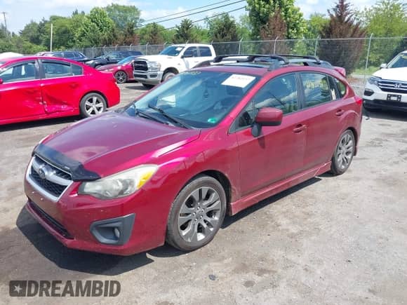 2012 Subaru Impreza Special Sports Limited z VIN JF1GPAS69CH242573, wystawiony jako IAAI lot #42782237 z przebiegiem 165 718 mil mil oraz . Historia ofert i sprzedaży dostępna na DreamBid. Obrazek 2.