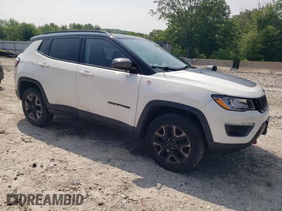 2017 Jeep Compass Trailhawk with VIN 3C4NJDDB8HT646763, listed as a Copart auction lot 60146095 with 132,504 mi miles and Salvage title. Bid and sale history available at DreamBid. Image 4.