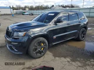 2012 Jeep Grand Cherokee SRT-8 z VIN 1C4RJFDJ9CC346187, wystawiony jako Copart lot #52351105 z przebiegiem 120 018 mil mil oraz Szkoda całkowita • Salvage title. Historia ofert i sprzedaży dostępna na DreamBid. Obrazek 1.