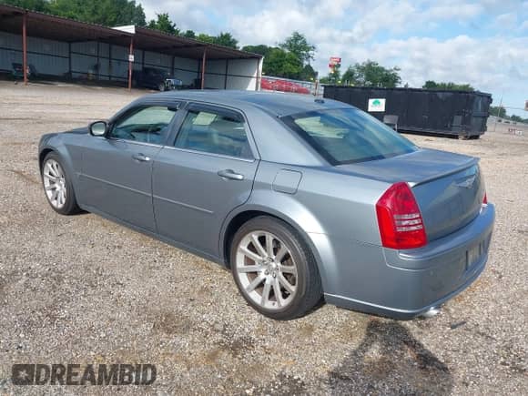 2006 Chrysler 300 C SRT-8 with VIN 2C3LA73W66H523504, listed as a IAAI auction lot 42483103 with 61,560 mi miles and . Bid and sale history available at DreamBid. Image 3.