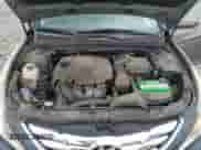 2011 Hyundai Sonata SE z VIN 5NPEC4AC0BH024561, wystawiony jako Copart lot #81709215 z przebiegiem 244 073 mil mil oraz Szkoda całkowita • Salvage title. Historia ofert i sprzedaży dostępna na DreamBid. Obrazek 11.