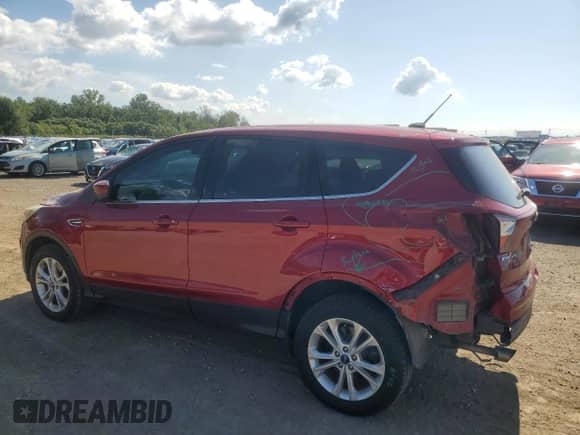 2017 Ford Escape SE с VIN 1FMCU9GD8HUC66378, выставлен на аукционе Copart как лот 70914105 с пробегом 136 895 миль миль и Списание • Salvage title. История ставок и продаж доступна на DreamBid. Изображение 2.