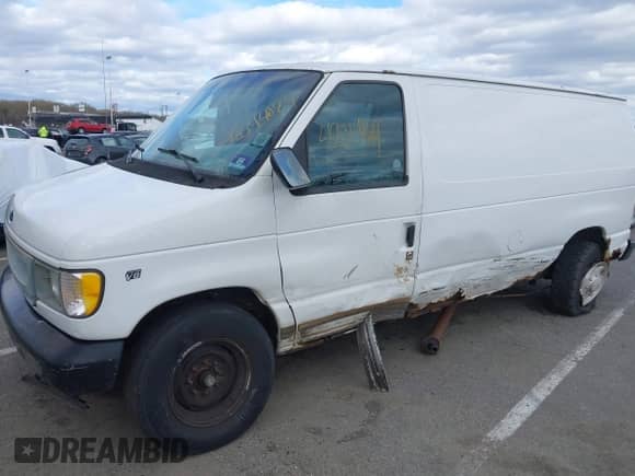 1999 Ford Econoline Cargo with VIN 1FTSE34L4XHA58575, listed as a IAAI auction lot 42534428 with 131,472 mi miles and . Bid and sale history available at DreamBid. Image 2.