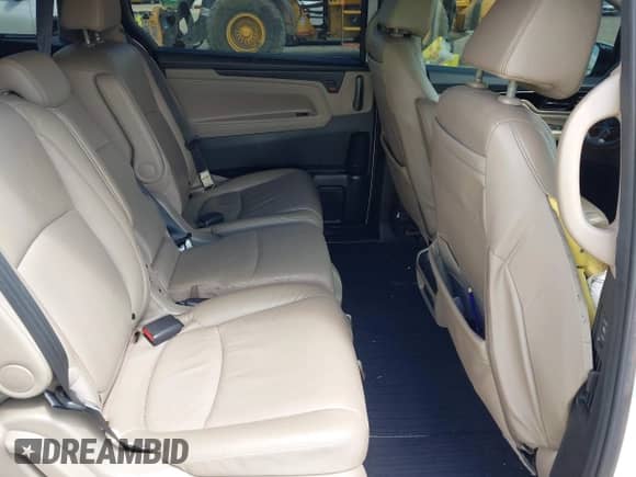 2020 Honda Odyssey Elite with VIN 5FNRL6H97LB058312, listed as a IAAI auction lot 42954678 with 92,976 mi miles and . Bid and sale history available at DreamBid. Image 8.