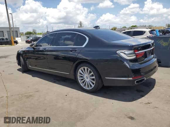 2016 BMW 7 Series 740i with VIN WBA7E2C58GG546644, listed as a Copart auction lot 58955835 with 90,671 mi miles and Salvage title. Bid and sale history available at DreamBid. Image 2.