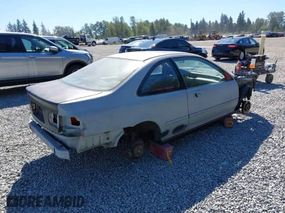1994 Honda Civic with VIN 1HGEJ112XRL023744, listed as a IAAI auction lot 42956800 with Not provided miles and . Bid and sale history available at DreamBid. Image 4.