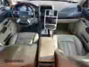 2007 Chrysler 300 C with VIN 2C3KA63H67H673721, listed as a Copart auction lot 64165845 with 103,207 mi miles and Salvage title. Bid and sale history available at DreamBid. Image 8.