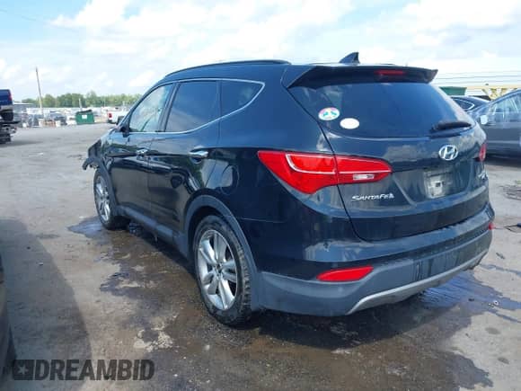 2015 Hyundai Santa Fe with VIN 5XYZW4LA4FG245064, listed as a IAAI auction lot 42728103 with 199,284 mi miles and . Bid and sale history available at DreamBid. Image 3.