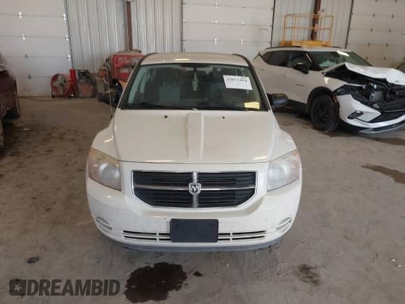 2008 Dodge Caliber SXT with VIN 1B3HB48B48D777684, listed as a IAAI auction lot 43072494 with 186,785 mi miles and . Bid and sale history available at DreamBid. Image 6.