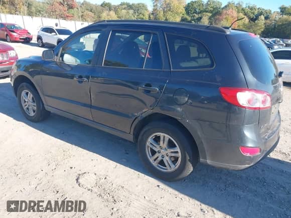 2011 Hyundai Santa Fe GLS z VIN 5XYZGDAB2BG083969, wystawiony jako IAAI lot #43480300 z przebiegiem 149 012 mil mil oraz . Historia ofert i sprzedaży dostępna na DreamBid. Obrazek 3.