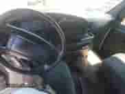 1996 Ford Econoline Cargo with VIN 1FBHE31HXTHA38341, listed as a Copart auction lot 63821515 with 152,959 mi miles and Clean title. Bid and sale history available at DreamBid. Image 9.