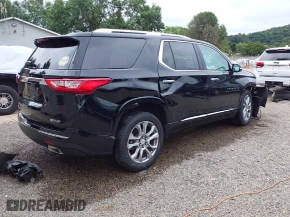 2018 Chevrolet Traverse Premier with VIN 1GNEVJKW4JJ256773, listed as a IAAI auction lot 43053281 with 116,244 mi miles and . Bid and sale history available at DreamBid. Image 4.