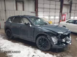 2024 Mazda CX-5 S Preferred z VIN JM3KFBCM0R0412764, wystawiony jako IAAI lot #41623682 z przebiegiem 22 853 mil mil oraz . Historia ofert i sprzedaży dostępna na DreamBid. Obrazek 1.