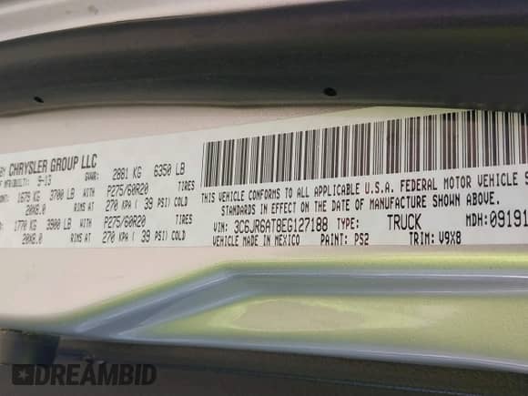 2014 Ram 1500 Express z VIN 3C6JR6AT8EG127188, wystawiony jako IAAI lot #41658879 z przebiegiem 93 431 mil mil oraz . Historia ofert i sprzedaży dostępna na DreamBid. Obrazek 9.