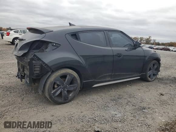 2013 Hyundai Veloster Turbo z VIN KMHTC6AE7DU163868, wystawiony jako Copart lot #89873585 z przebiegiem 80 461 mil mil oraz Czysty tytuł • Clean title. Historia ofert i sprzedaży dostępna na DreamBid. Obrazek 3.