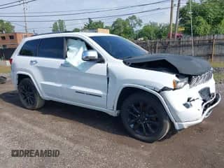 2017 Jeep Grand Cherokee Overland with VIN 1C4RJFCT6HC880306, listed as a IAAI auction lot 42534987 with 97,976 mi miles and . Bid and sale history available at DreamBid. Image 1.