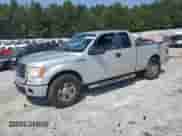 2009 Ford F-150 STX with VIN 1FTRX12W69KB73890, listed as a Copart auction lot 71760015 with 525,469 mi miles and Salvage title. Bid and sale history available at DreamBid. Image 1.