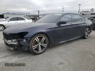 2019 BMW 7 Series 750i with VIN WBA7F0C57KGM24657, listed as a Copart auction lot 84496664 with 105,864 mi miles and Salvage title. Bid and sale history available at DreamBid. Image 1.