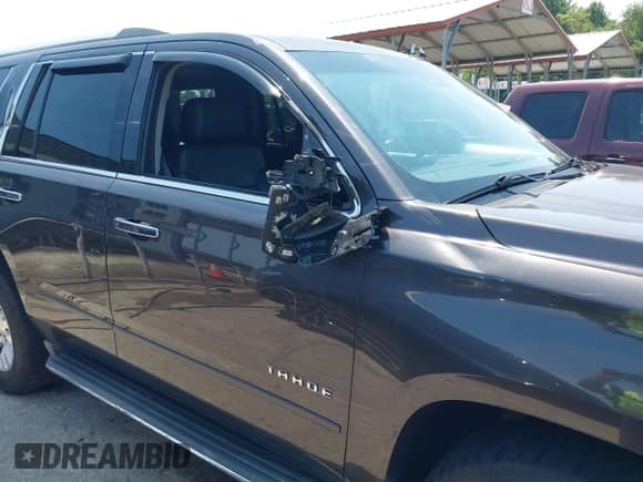 2015 Chevrolet Tahoe LTZ with VIN 1GNSKCKC2FR588524, listed as a IAAI auction lot 42851274 with 101,426 mi miles and . Bid and sale history available at DreamBid. Image 6.