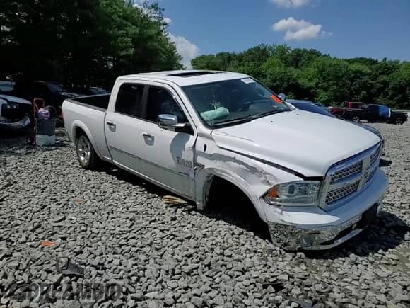 2016 Ram 1500 Laramie z VIN 1C6RR7VT2GS157530, wystawiony jako Copart lot #61051075 z przebiegiem 116 655 mil mil oraz Szkoda całkowita • Salvage title. Historia ofert i sprzedaży dostępna na DreamBid. Obrazek 13.