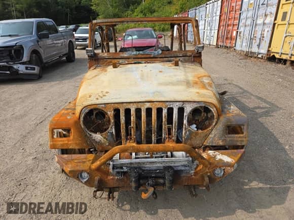 2004 Jeep Wrangler Sahara с VIN 1J4FA59S74P718631, выставлен на аукционе Copart как лот 62816605 с пробегом Не указан миль и На запчасти • Non repairable. История ставок и продаж доступна на DreamBid. Изображение 5.