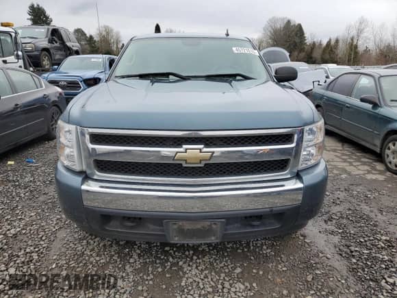 2007 Chevrolet Silverado 1500 LS with VIN 2GCEK13C771544361, listed as a Copart auction lot 45721515 with 100,636 mi miles and Salvage title. Bid and sale history available at DreamBid. Image 5.