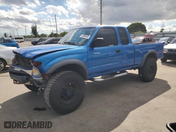 2004 Toyota Tacoma PreRunner with VIN 5TESN92N54Z340774, listed as a Copart auction lot 82484455 with 147,005 mi miles and Salvage title. Bid and sale history available at DreamBid. Image 1.
